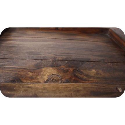 Close-up of the eco-friendly Rosewood Console surface with visible grains and knots, featuring a slightly glossy finish. The wood exhibits natural color variations from light to dark brown, creating an earthy texture ideal for dining room furniture.