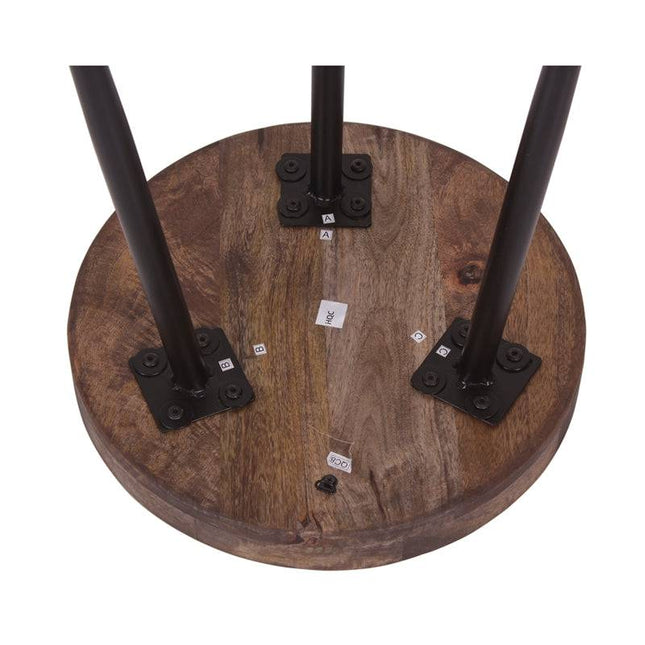 The Mango Bowl Side Table is a mid-century style piece with a round mango wood tabletop and three sleek black metal legs secured by sturdy brackets. Small adhesive labels with letters and numbers on the surface provide assembly instructions. The background is white and uncluttered.