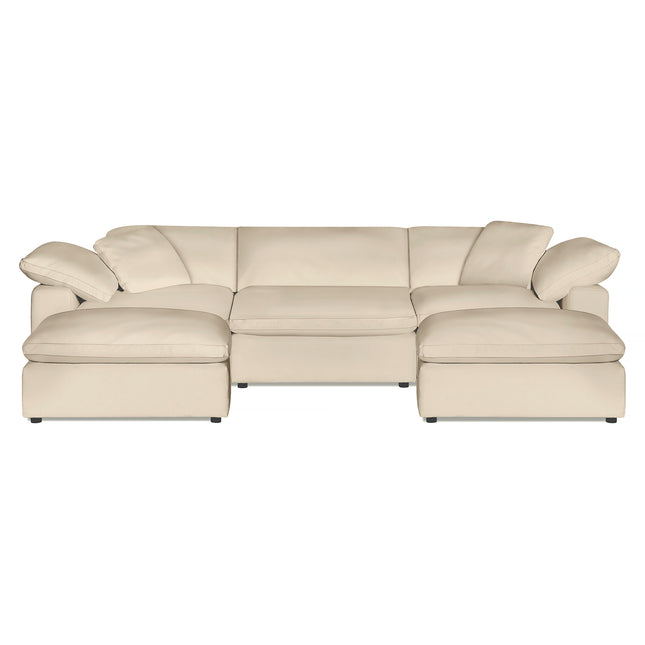 The Peyton 3 Piece Straight + 2 Ottomans offers luxury with its spacious beige sectional design, plush down and feather cushions, and wide armrests. Its modern style adapts to any space, set against a plain white background.