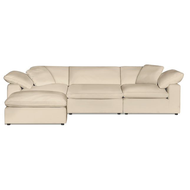 The Peyton 3 Piece Straight+ Ottoman, a beige L-shaped sectional with plush cushions and wide armrests, adds a luxurious touch. Its modern design stands on small dark legs, creating a comfort sanctuary against the plain white background.