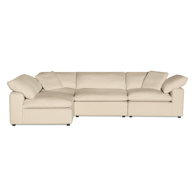 The Peyton 4 Piece L-shaped sectional sofa, in luxurious cream, features plush cushions and wide armrests for ultimate comfort. Its sleek design and adaptability to various spaces make it a standout against a plain white background.