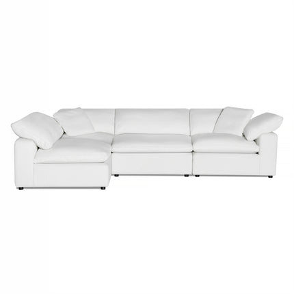 The Peyton 4 Piece white sectional sofa radiates luxury with its three seats and left-side extended chaise. Wrapped in smooth fabric and plush cushions, it appears on a plain white background, perfect for enhancing any elegant living space.