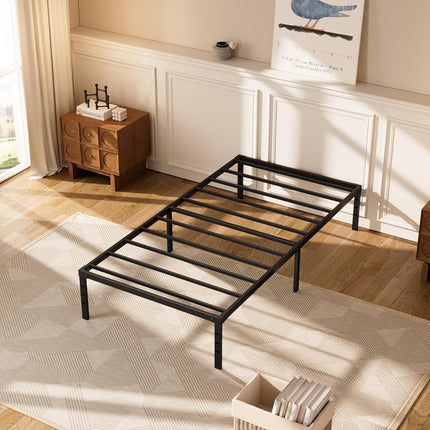 The My Cloud Mattress Platform sits in a sunlit bedroom with wood floors, featuring a patterned rug, wooden furniture, and framed artwork. Sheer curtains on the window let natural light fill the space.