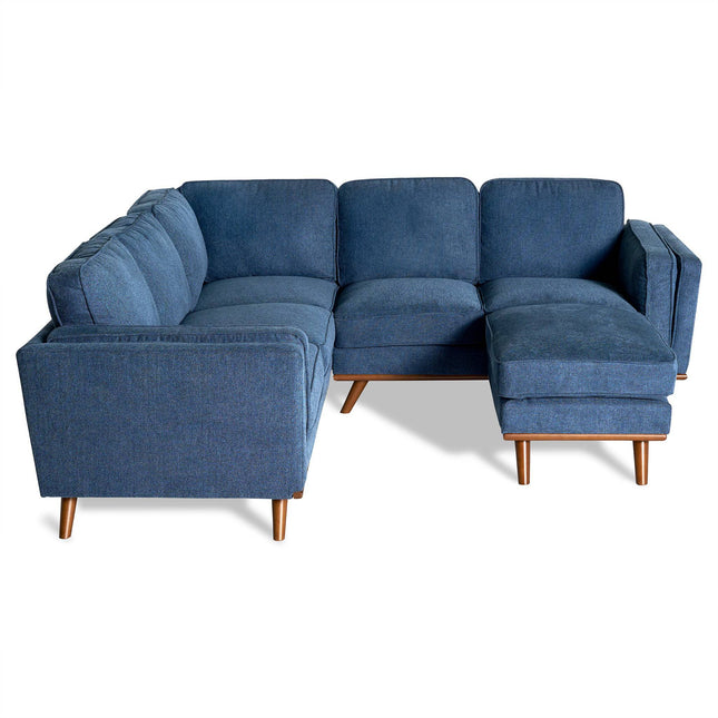 The Maddox sectional is a beautiful mid-century modern sofa with a blue L-shaped design and wooden legs. It features three cushions per section and an extended right-side chaise. Its soft, textured fabric adds comfort, making it perfect for any living room.