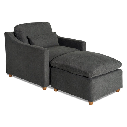 The My Cloud Slope Chair, in dark gray, includes a matching ottoman and wooden legs. With sloped armrests and a cushioned backrest, this set offers modern comfort like sitting on My Cloud.