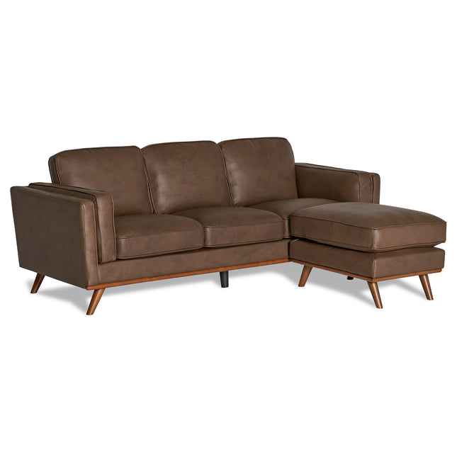 The Maddox Sofa is a brown leather sectional with a right-side chaise, plush back cushions, two armrests, and tapered wooden legs, all in an elegant mid-century modern design.