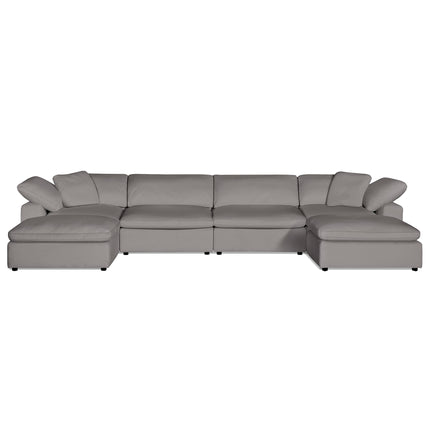 The Peyton 4 Piece Straight + 2 Ottomans is a luxurious, modern gray sectional sofa with plush down & feather cushions. Designed for comfort and style, it features smooth fabric and rests on dark, low-profile legs.