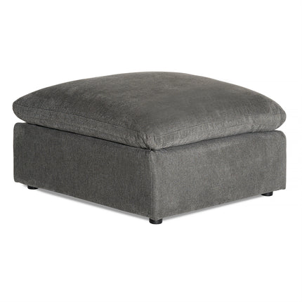 The My Cloud Slope 40 Ottoman features a square, modern design with dark gray fabric and low black feet, offering comfortable elegance. The plush top cushion, matching the base in color and texture, adds a serene touch to any space.