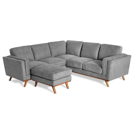 The Maddox is a modern L-shaped gray sectional with wooden legs, thick cushions, and an extended chaise; it provides a contemporary and comfortable seating solution that complements mid-century modern aesthetics.