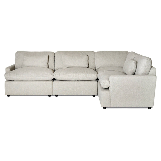 The My Cloud / Classic Arm is a light gray, L-shaped sectional with plush cushions and three connected sections. It offers spacious, comfortable seating with modern style, customizable to fit any room, set against a plain white background.
