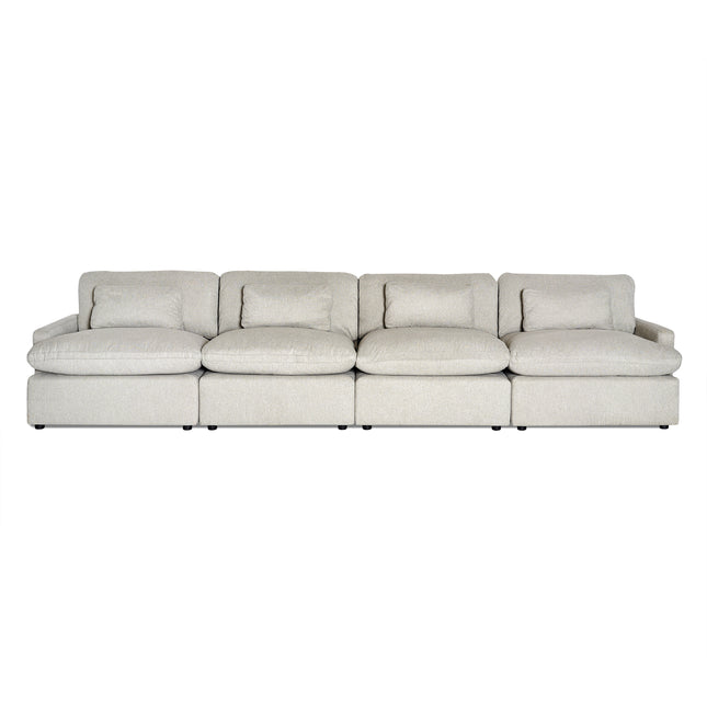 The My Cloud 4 Piece Straight is a beige sofa with four sections, plush cushions, and low armrests. Its minimalist design features machine-washable fabric for easy adaptation to various interiors. Explore the Worlds Greatest & Most Comfortable Sofa for your home today.