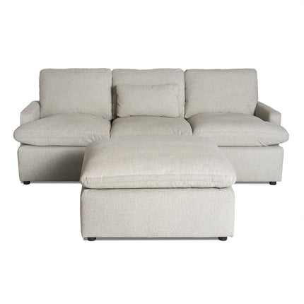 The My Cloud Sofa is a light gray sectional that includes three seat cushions, three back cushions, and a matching ottoman. It boasts a modern minimalist look with plush rectangular armrests for comfort.