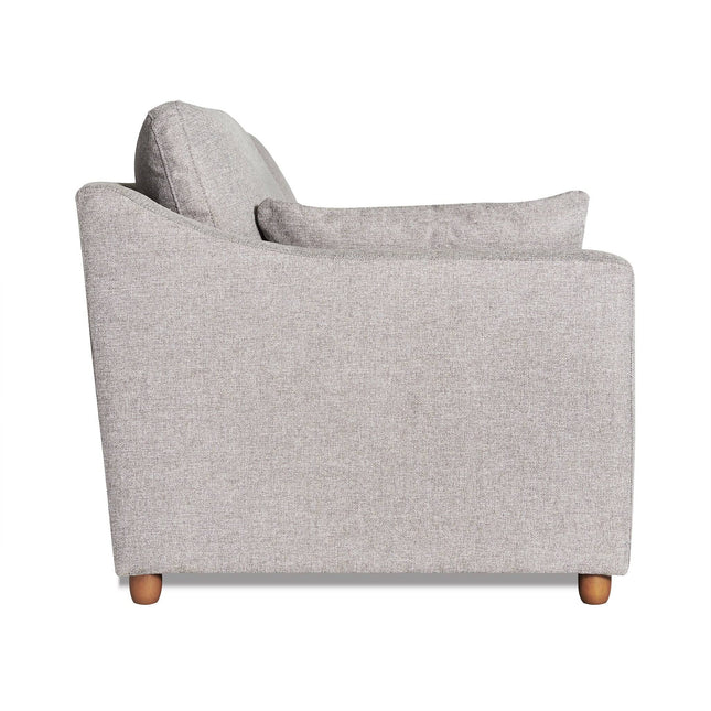 Side view of the My Cloud Slope Loveseat in light gray, featuring two seat and backrest cushions. Its minimalist design includes wooden legs, subtly textured fabric, slightly rounded armrests, and is part of the customizable collection for those valuing durable furniture.