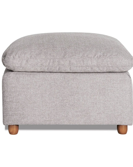The My Cloud Slope 30 Ottoman in gray features a cushioned top and wooden legs, offering a blend of comfort and modern design. Its textured fabric enhances both style and comfort.