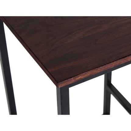 Close-up of a table corner with a luxurious dark wood tabletop featuring a smooth finish and black metal legs, embodying a modern industrial style. Handcrafted Rosewood Stools complete the minimalist design.