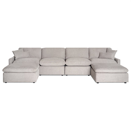 The My Cloud Slope 4 Piece Straight + 2 Ottomans is a large, light gray modular sectional sofa featuring plush cushions and armrests on each end. Its U-shaped design and small dark feet give it a clean, modern appearance, resembling the comfort of My Cloud.