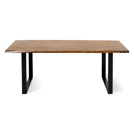 The Live Edge Dining Table boasts a rectangular wooden surface with a live edge acacia finish and sturdy black U-shaped metal legs. Made from unique wood slabs, it offers a minimalist, modern aesthetic ideal for an inviting atmosphere.