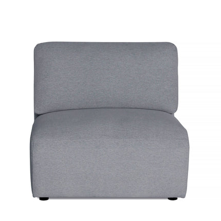 The Lugano Armless features a simple, modern design with premium materials. Its cushioned seat and backrest, upholstered in smooth fabric, allow endless configuration options. This minimalistic chair integrates seamlessly into diverse interior settings.