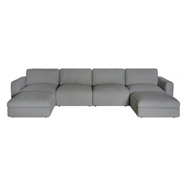 The Lugano 4 Piece Straight + 2 Ottoman is a large, modern gray sofa offering low backrests and wide seats. It features left and right-side chaises forming a U-shape, upholstered in smooth premium materials for an Italian luxury feel with its minimalist and contemporary design.