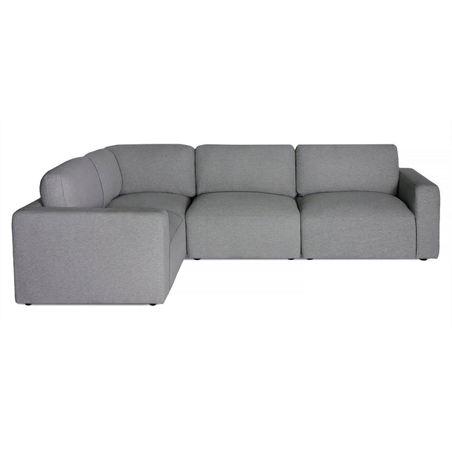 Discover the Lugano Sectional, a luxurious Italian L-shaped sofa with plush cushions and wide armrests. Perfect for modern living rooms, it provides ample seating and a minimalist design that radiates elegance.