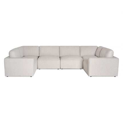The Lugano 6 Piece Pit, exuding Italian luxury, is a light gray, U-shaped sofa featuring six connected seats and low, wide armrests. Set against a white background, its minimalist design highlights clean lines and a contemporary style reminiscent of La Dolce Vita.
