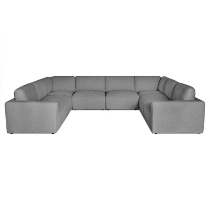 The Lugano 8 Piece Pit is an Italian luxury U-shaped sectional sofa featuring wide, cushioned seats and backrests. Its crafted from premium materials with a minimalist design, smooth fabric texture, and low-profile armrests, making it ideal for a contemporary living room.