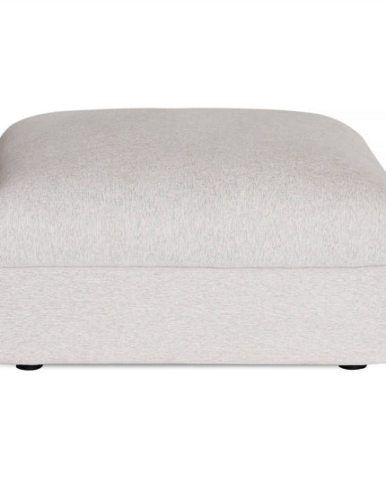 Discover Italian luxury with the Lugano Storage Ottoman, a large rectangular unit made from premium materials in a light gray color. Its smooth, cushioned top and floor-sitting design without visible legs showcase minimalist elegance and contemporary style.
