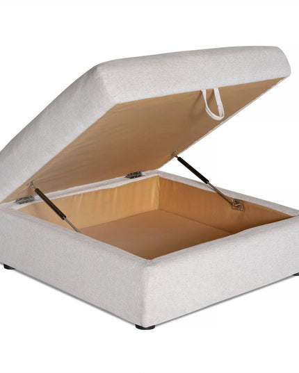 Explore the Lugano Storage Ottoman, a square, light gray piece crafted from premium materials. Its hinged lid opens to reveal a spacious tan-lined compartment inside, supported by two robust metal hinges—a true mark of Italian luxury.