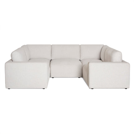 The Lugano 5 Piece Pit, a luxurious Italian U-shaped sofa with minimalist design, plush cushions, and low-profile armrests, embodies contemporary La Dolce Vita. Set against a white background, it perfectly captures the essence of modern elegance.