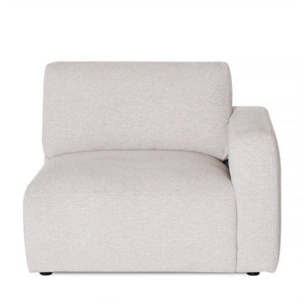 The Lugano Right Arm is a modern, light gray upholstered armchair featuring a square, minimalist design. It includes plush cushions and a right-side armrest with a slightly reclined backrest, all set on small black legs crafted from premium materials.