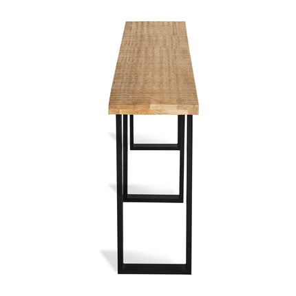 Side view of the Mango Console, a narrow table made from eco-friendly mango wood with a natural finish and rectangular top. Its black metal legs create a frame-like structure, ideal for minimalist dining rooms.