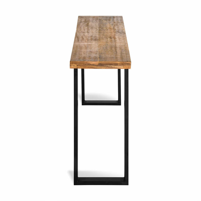 The Mango Console is a stylish wooden table with a natural finish, perfect for dining rooms. It features a rectangular mango wood top and black metal legs in a geometric design, showcasing its minimalist and modern aesthetic with an eco-friendly touch.