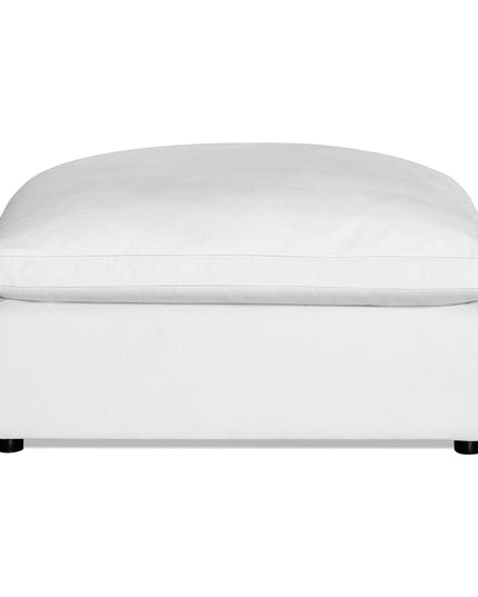 Discover the Peyton Ottoman, a white piece with plush cushions and short dark legs, boasting a minimalist design for a clean look that complements any space.