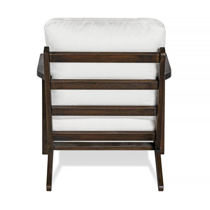 The Peyton Chair boasts a slatted back and cushioned seat in mid-century style. With a white cushion, dark wood finish, and slightly angled legs, its both comfortable and stylish when viewed from behind.