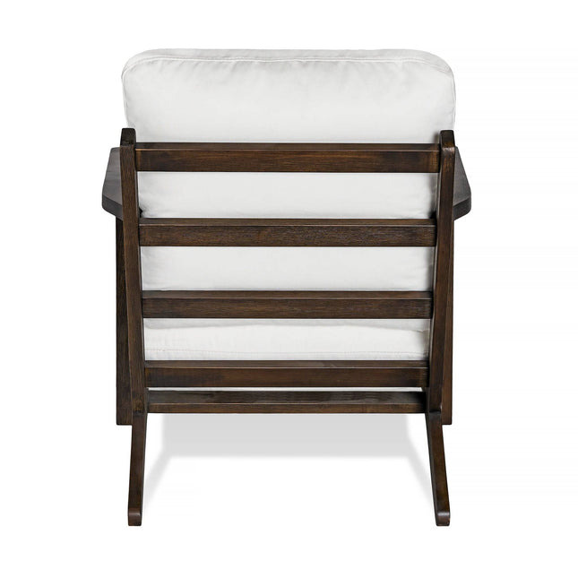 The Peyton Chair boasts a slatted back and cushioned seat in mid-century style. With a white cushion, dark wood finish, and slightly angled legs, its both comfortable and stylish when viewed from behind.