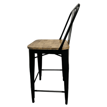 Side view of the Mango Counter Stool, featuring a tall mango wood seat and a black metal frame. Ideal for kitchens, this stool showcases an industrial design with a backrest supported by thin vertical bars.