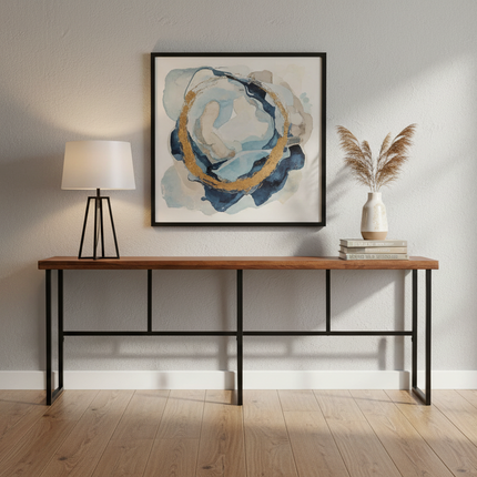 Rosewood Console styled in a modern entryway with framed artwork, a table lamp and pampas grass