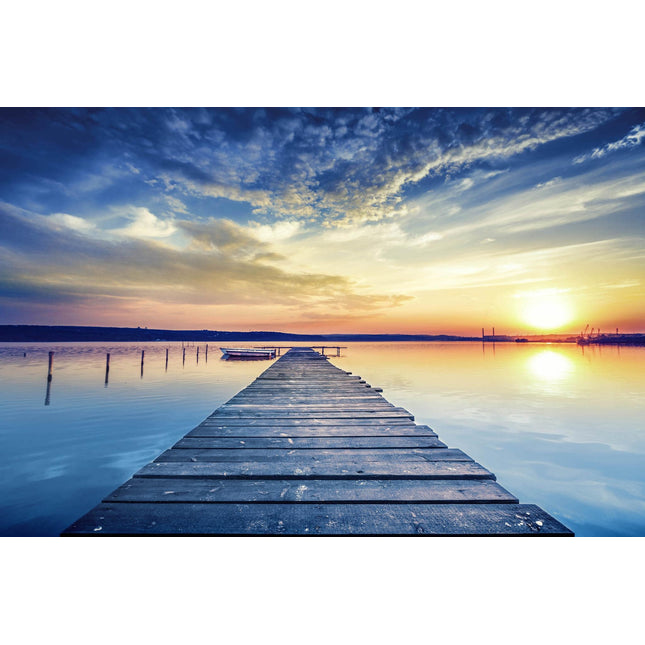 The Sunset Dock extends over a tranquil lake, reflecting the sunsets vibrant hues like museum-quality art. The sky merges deep blues with warm oranges and scattered clouds, while a small boat moored beside the dock adds to the serene ambiance.
