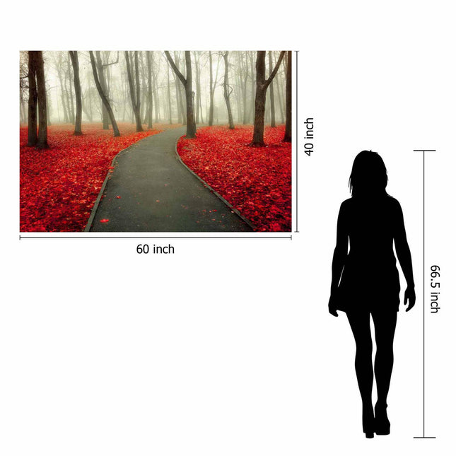 A silhouette beside the framed Red Autumn artwork provides a size reference. This museum-quality piece depicts a forest path with red leaves and misty trees encased in tempered glass. The artwork measures 60 inches wide by 40 inches tall, and the silhouette is 66.5 inches high.