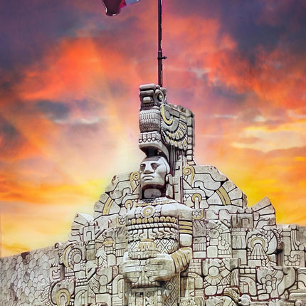 The Mexican Pride monument showcases intricate carvings and a large Mexican flag, set against a sunset sky. This stone structure features museum-quality artwork with indigenous motifs and a bold central figure, leaving a lasting impression on all who visit.