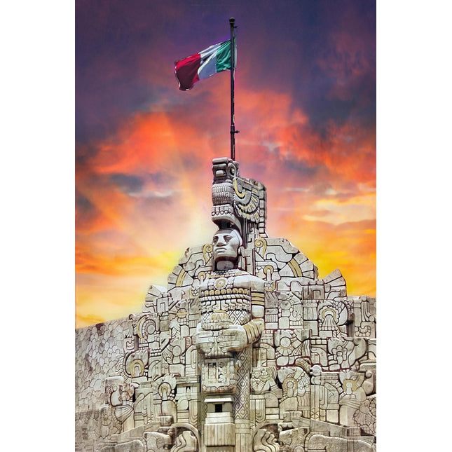 The Mexican Pride monument showcases intricate carvings and a large Mexican flag, set against a sunset sky. This stone structure features museum-quality artwork with indigenous motifs and a bold central figure, leaving a lasting impression on all who visit.