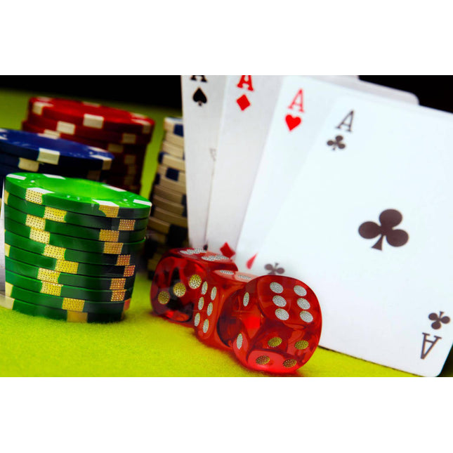 Stacks of colorful poker chips, two red dice, and four ace playing cards (hearts, spades, clubs, diamonds) rest on a green felt surface like a museum-quality artwork scene. Product: Vegas Baby.