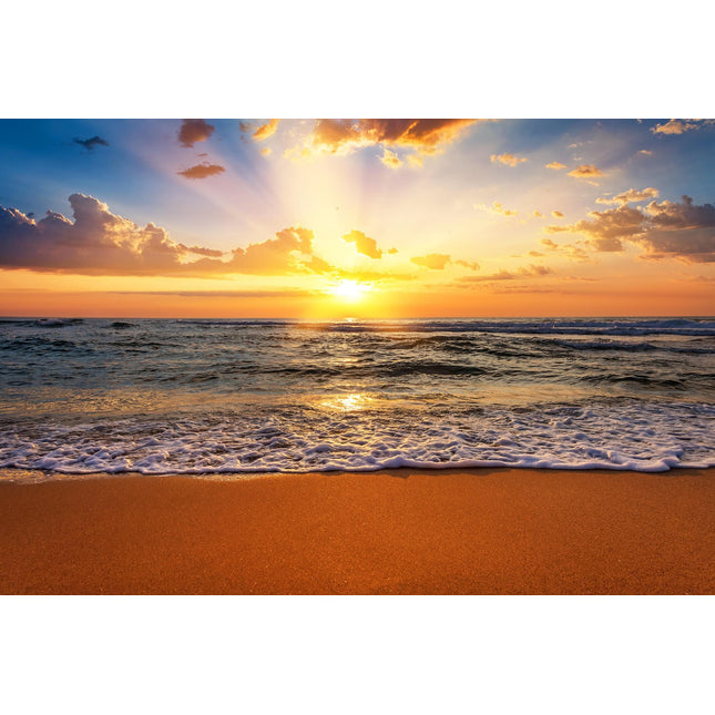 The Sunset Beach product features a vibrant ocean sunset with golden light streaming through clouds. The suns reflection on the water and gentle waves on the sandy shore create a serene ambiance, ideal for museum-quality artwork in your home or office.
