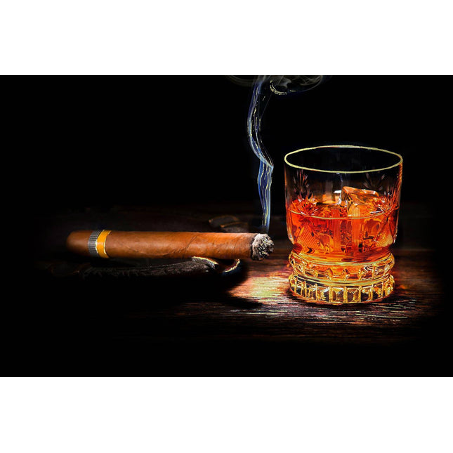 The Cohiba & Whiskey set features a lit cigar resting in an ashtray, with smoke curling beside a whiskey on the rocks. Both items are placed on a dark wooden surface under dramatic lighting, creating a scene reminiscent of museum-quality artwork, perfect for any home or office.
