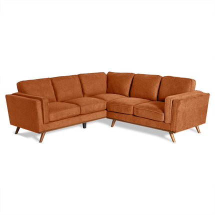 The Maddox is a mid-century modern L-shaped sectional, featuring brown upholstery, tufted seats, and plush cushions. Its elegant angled wooden legs add timeless appeal to any living room corner.