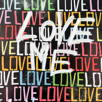 The Love Me artwork features graffiti-style art with LOVE ME in white, spray-painted over a vibrant background. The hand-painted canvas layers LOVE repeatedly in red, green, yellow, pink, and white for an eye-catching effect.