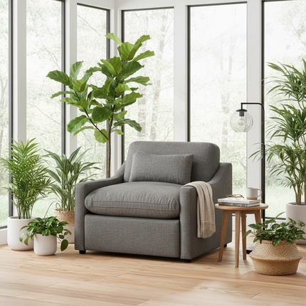 My Cloud Slope Power Recliner in Classic Gray staged in a bright plant-filled sunroom