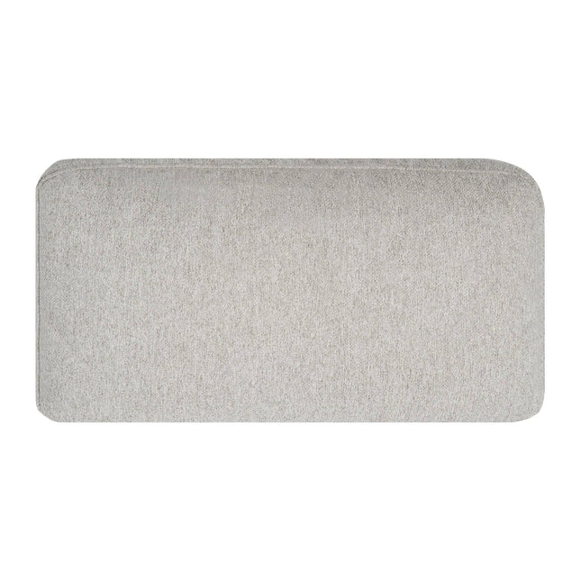 The My Cloud Pillow is a sleek rectangular gray door mat with rounded corners and a textured fabric surface. Its simple yet elegant design makes it an ideal complement for any sectional sofa, enhancing both indoor and outdoor spaces effortlessly.