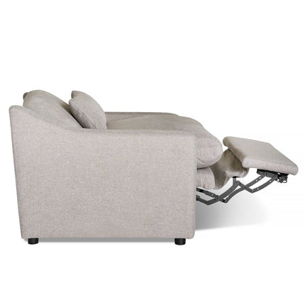 Side view of a light gray My Cloud Slope Power Recliner with extended footrest. It features soft fabric upholstery, rounded armrests, and a cushioned backrest for cloud-like comfort.
