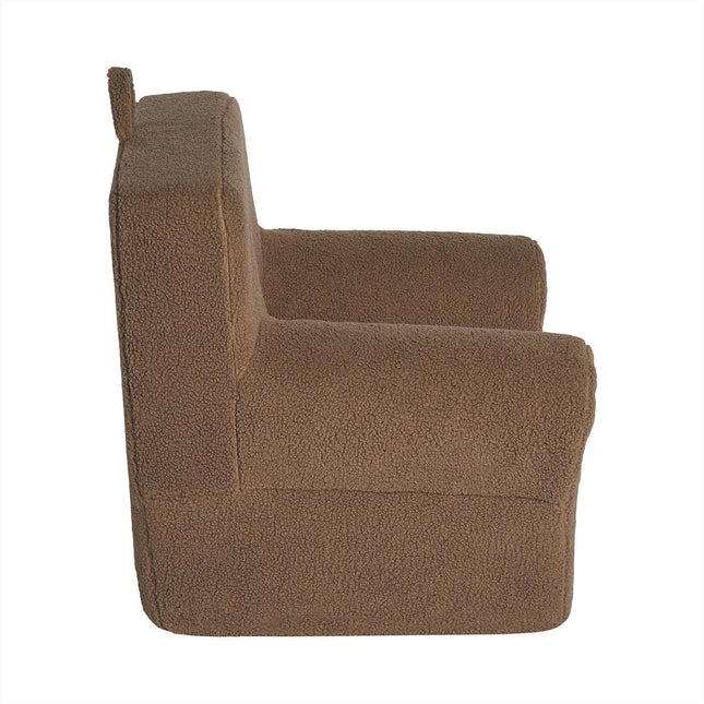 Introducing the My Cloud Kidz Chair, a plush childrens chair in soft Sherpa fabric. It has a simple side profile with a slightly reclined backrest and flat arms, offering cozy comfort for your little one.